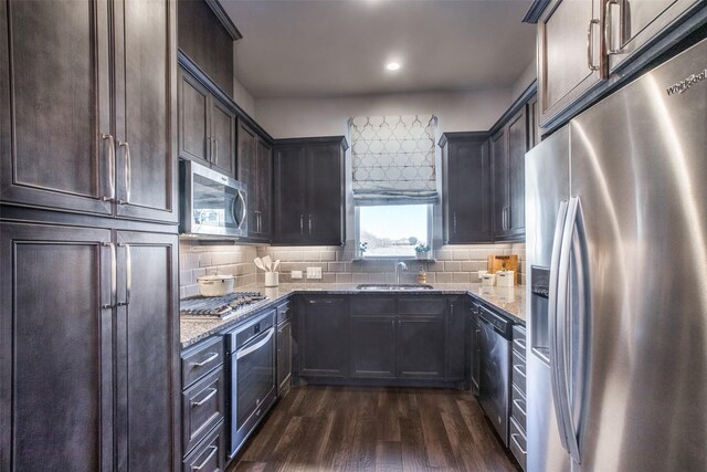 laundry room with light tile patterned floors and washing machine and clothes dryer