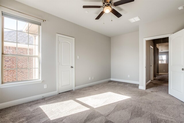 unfurnished room featuring carpet floors