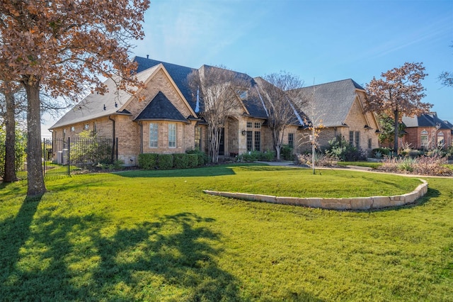 view of front of house with a front lawn