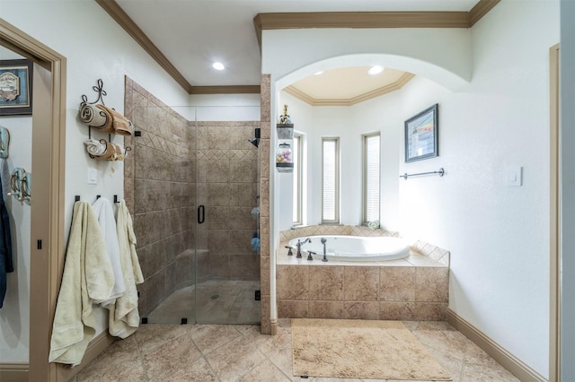 bathroom featuring independent shower and bath and ornamental molding