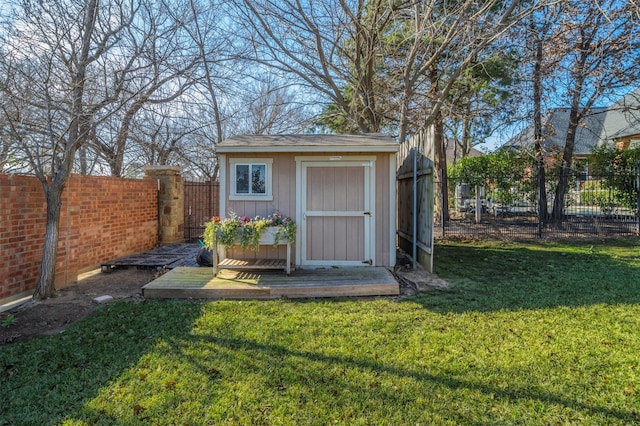 view of outbuilding featuring a lawn