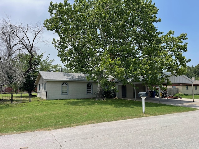 view of front of home with a front yard