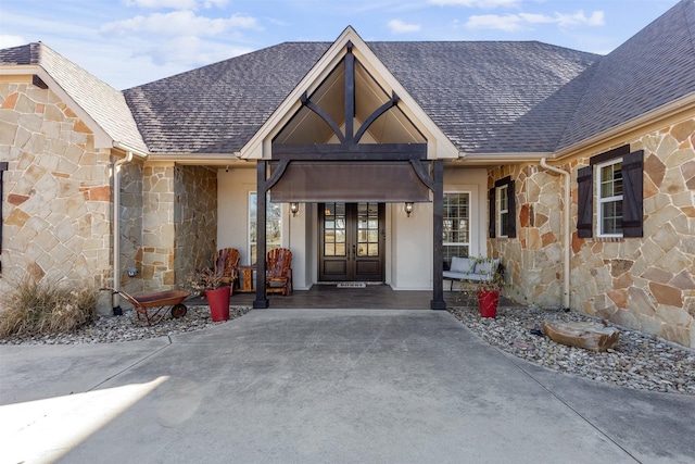 doorway to property featuring french doors