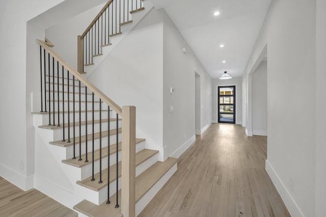 entrance foyer with light hardwood / wood-style floors