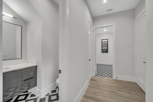 hallway featuring light hardwood / wood-style floors