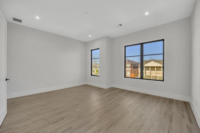 empty room featuring light hardwood / wood-style floors