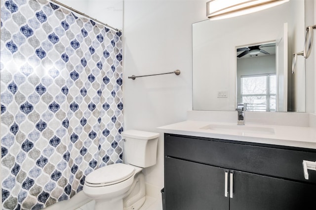 bathroom featuring ceiling fan, vanity, and toilet