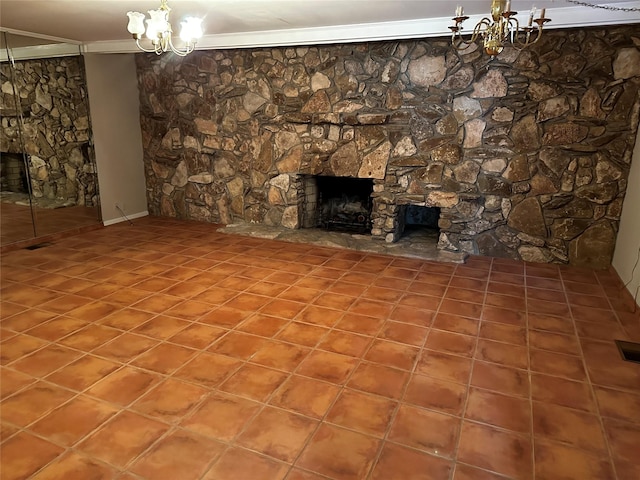 unfurnished living room with a notable chandelier, ornamental molding, and a fireplace