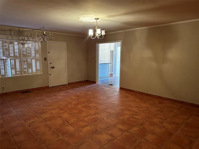 unfurnished room featuring visible vents, an inviting chandelier, and ornamental molding