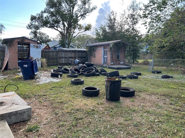 view of yard with a storage shed