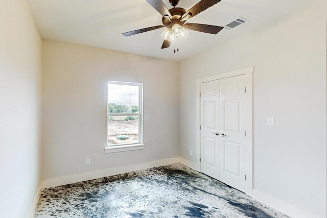 spare room with ceiling fan