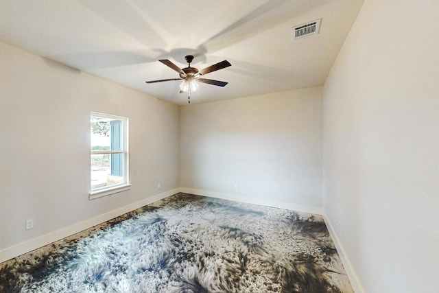 spare room with ceiling fan