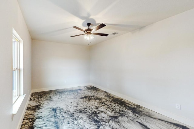 unfurnished room featuring ceiling fan