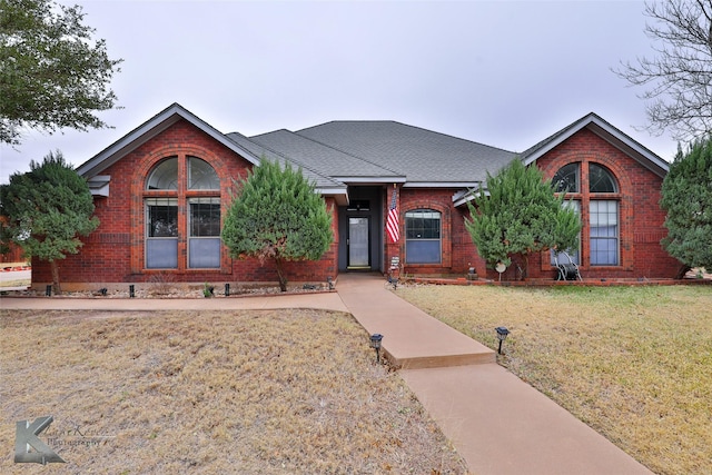 view of front of home with a front yard