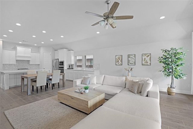 living room featuring ceiling fan