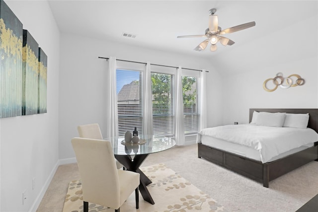 bedroom featuring light carpet, ceiling fan, and lofted ceiling