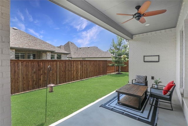 view of patio featuring ceiling fan