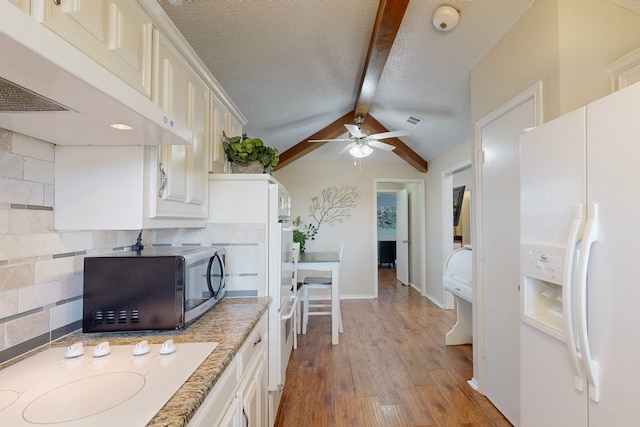 kitchen featuring hardwood / wood-style floors, white appliances, exhaust hood, vaulted ceiling with beams, and decorative backsplash