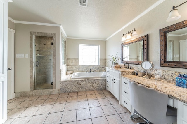 bathroom with a shower stall, ornamental molding, a bath, vanity, and tile patterned flooring