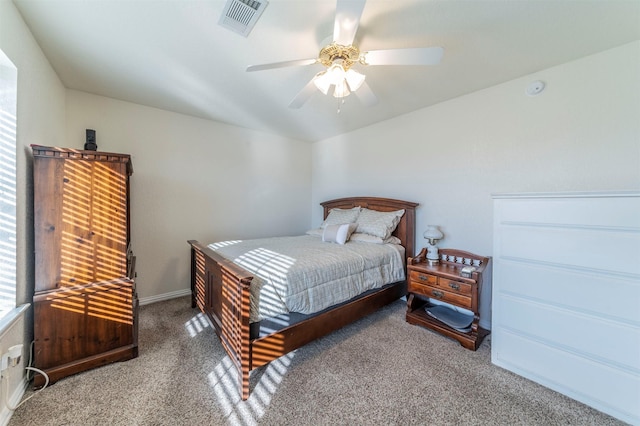 bedroom with ceiling fan and carpet