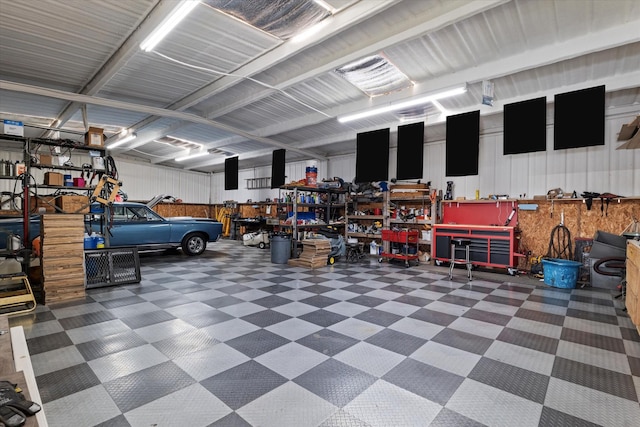 garage with a workshop area