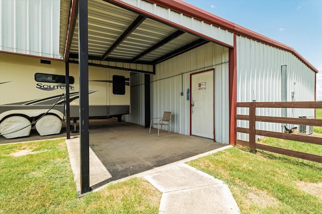 view of outbuilding with a carport