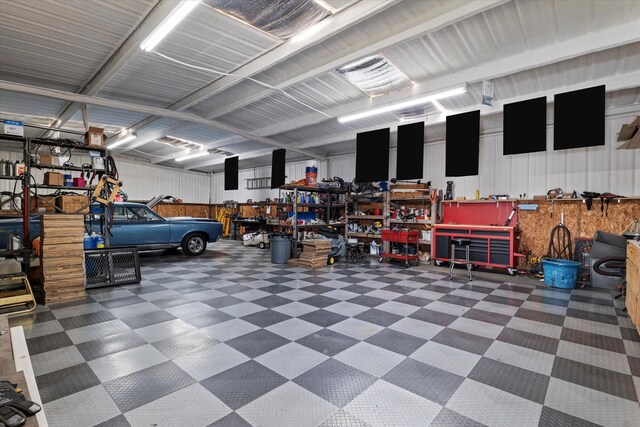 garage with a workshop area
