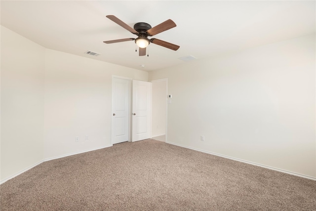 carpeted empty room with ceiling fan