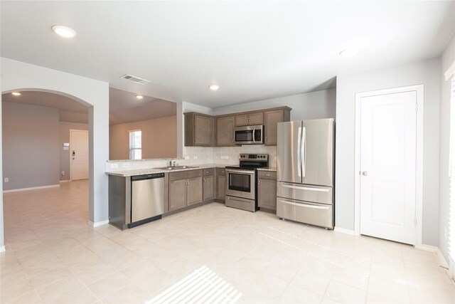 bathroom with vanity, tile patterned floors, and a shower with shower door