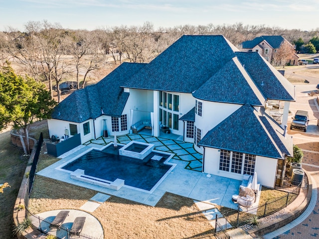 rear view of property featuring an outdoor living space, a patio, and central air condition unit