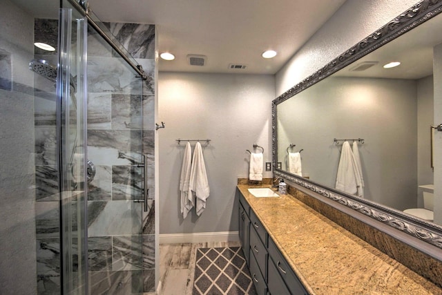 bathroom featuring vanity and walk in shower