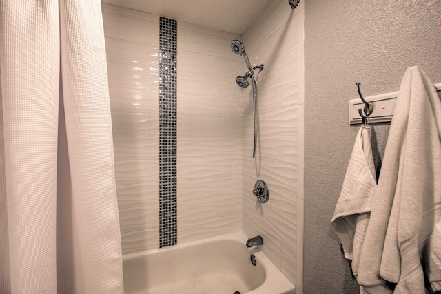 bathroom featuring shower / tub combo with curtain