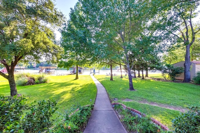 view of home's community featuring a yard