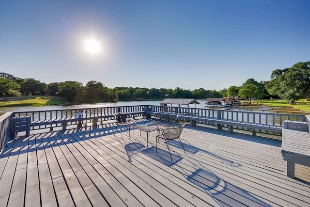 deck featuring a water view