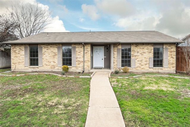 single story home with a front yard