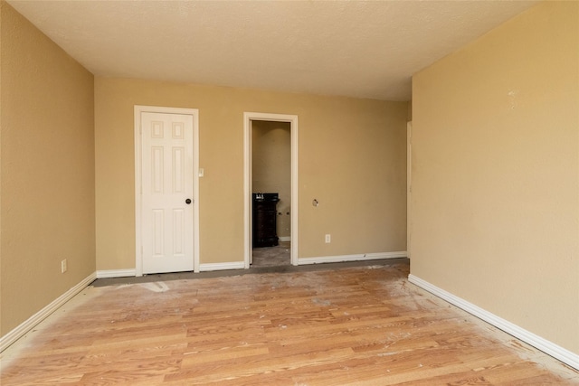 unfurnished bedroom with light hardwood / wood-style flooring