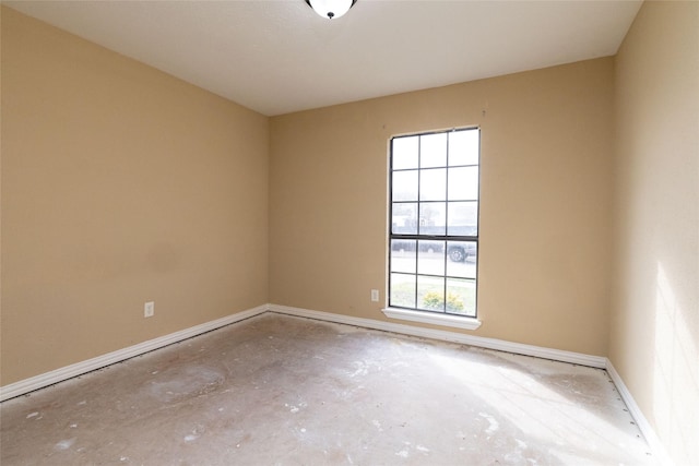 empty room featuring concrete flooring