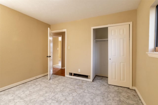 unfurnished bedroom featuring a closet