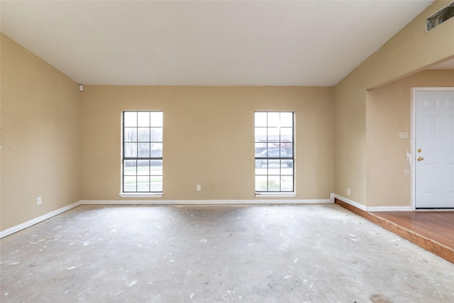 spare room featuring concrete floors