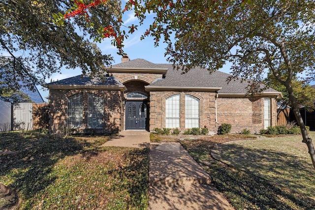 view of front of house with a front yard