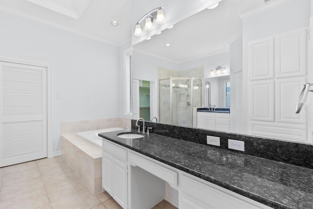 bathroom featuring ornamental molding, tile patterned flooring, plus walk in shower, and vanity