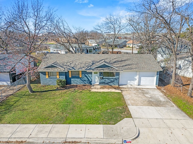 ranch-style home with a garage and a front lawn