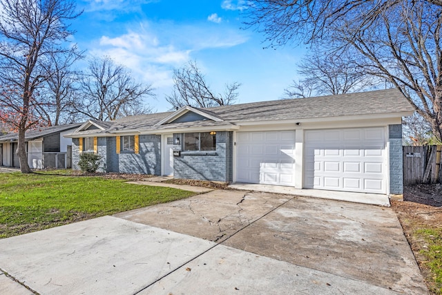 single story home featuring a front yard and a garage