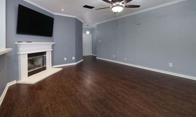 unfurnished living room with ceiling fan, ornamental molding, and dark wood-type flooring