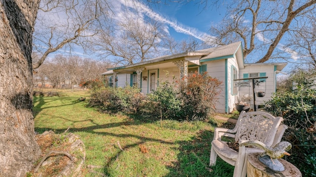 exterior space with a front yard