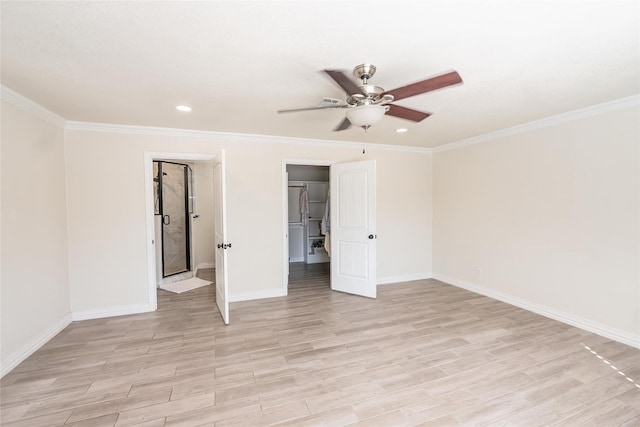 unfurnished bedroom featuring light wood-type flooring, ceiling fan, and ornamental molding