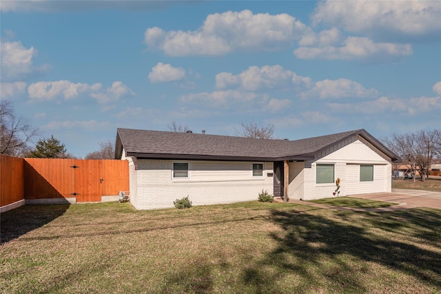 ranch-style house with a patio area and a front yard