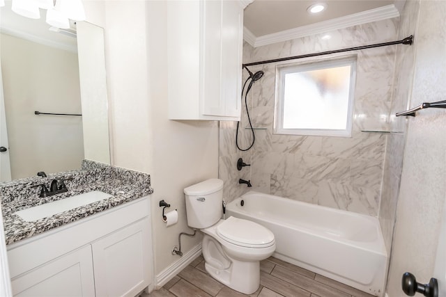 full bathroom with tiled shower / bath combo, toilet, crown molding, and vanity