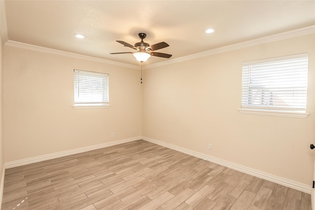 unfurnished room featuring ceiling fan, light wood-type flooring, and crown molding