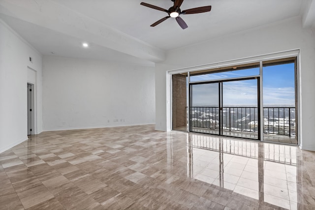 empty room with a wealth of natural light and ceiling fan